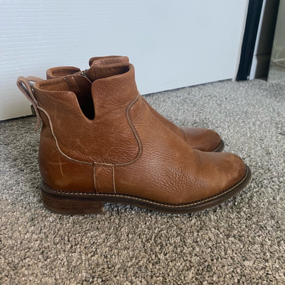Tan booties with side zippers